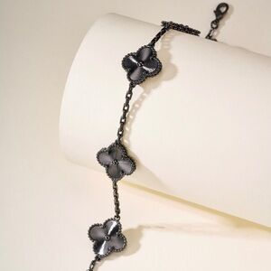 Van Cleef & Arpels Black Four-Petal Motif Bracelet